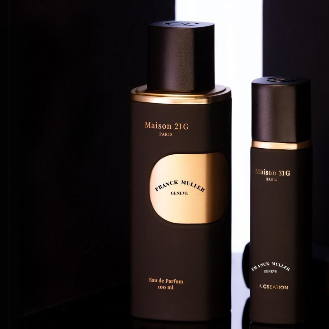Two Eau de Parfum bottles created for Franck Muller, in black and gold.